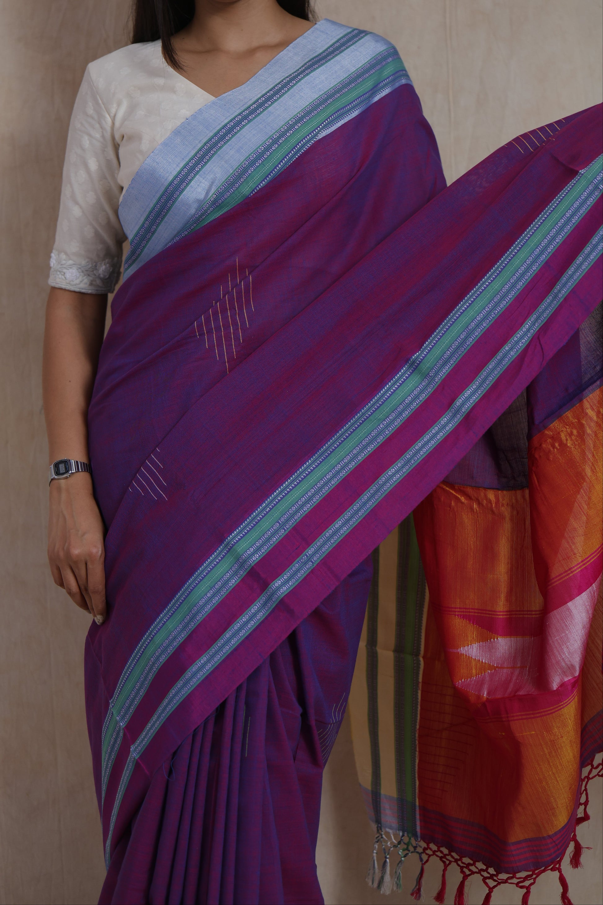 Detailed view of handwoven purple Ilkal cotton saree with contrast border and pallu