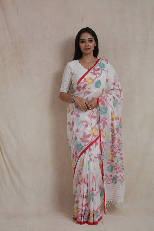 Front view of ivory white Bengal Cotton Fulia saree with multicolor floral woven motifs and red border