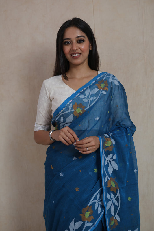 Detailed view of Bengal Cotton Fulia saree with floral motifs, woven border and elegant cotton