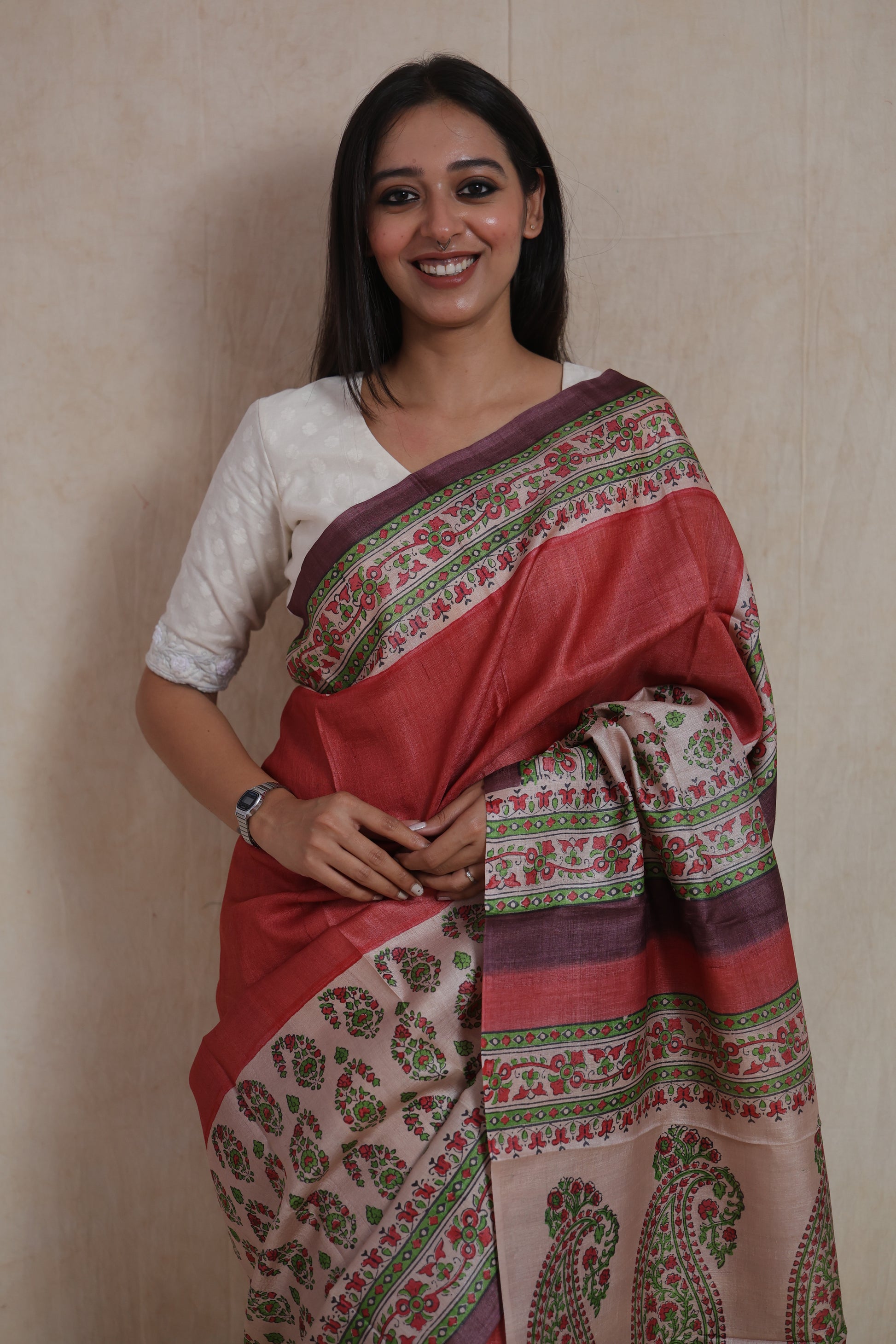 Close-up of floral printed border and paisley motifs on Tussar saree
