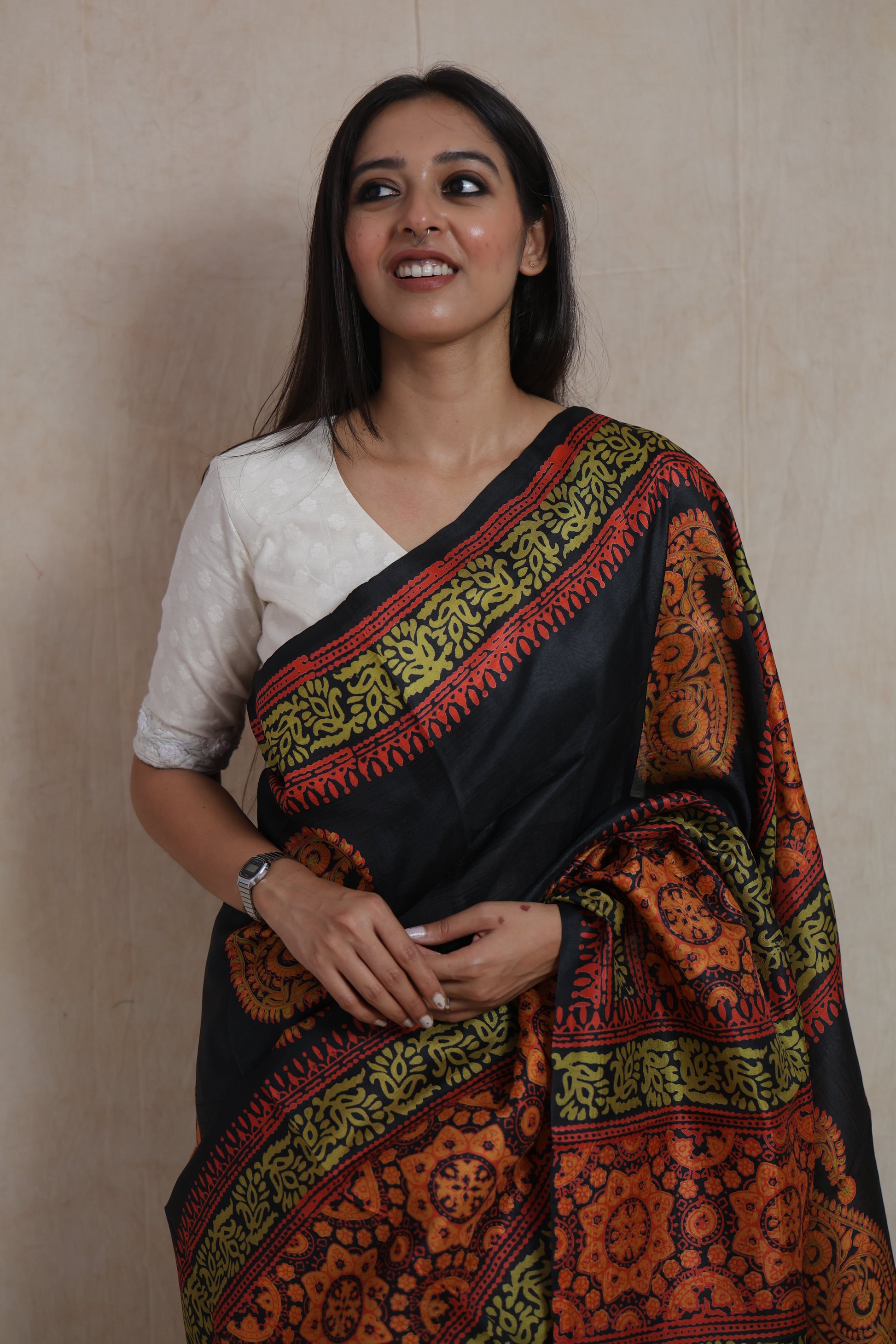 Elegant black Batik silk saree with rust orange handcrafted ethnic motifs