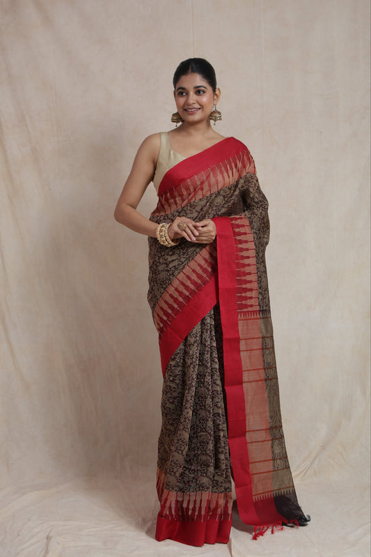 Front drape view of elegant black Kanchipuram handloom cotton saree with red border