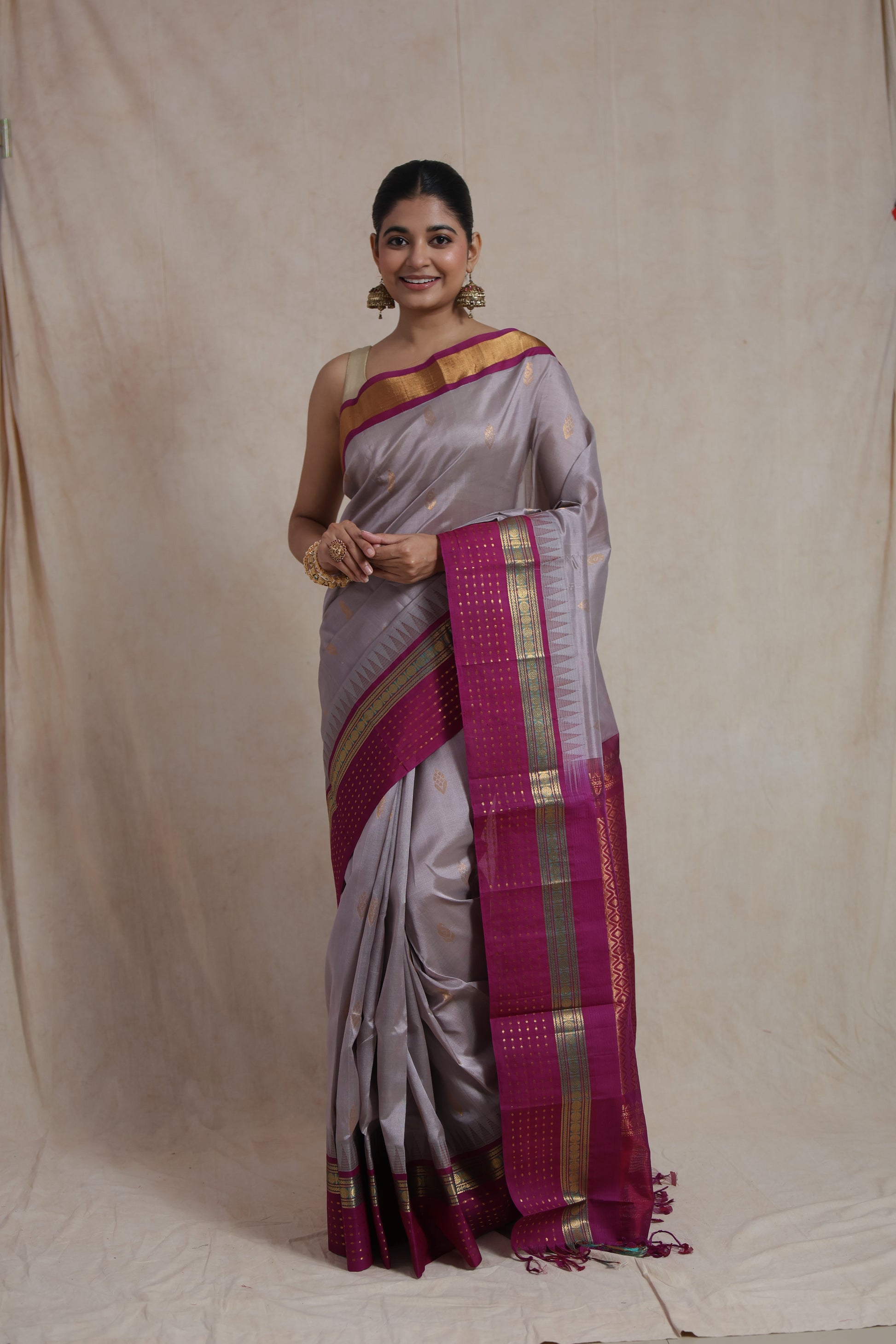 Front view of silver grey handloom Sico saree with traditional woven detailing