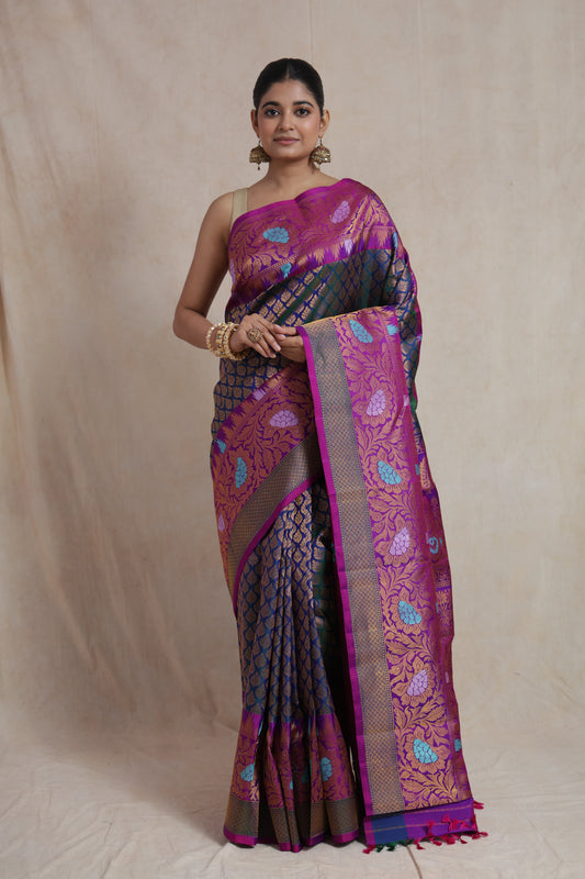 Full view of Royal Navy Blue Gadwal Silk Saree with magenta floral woven border