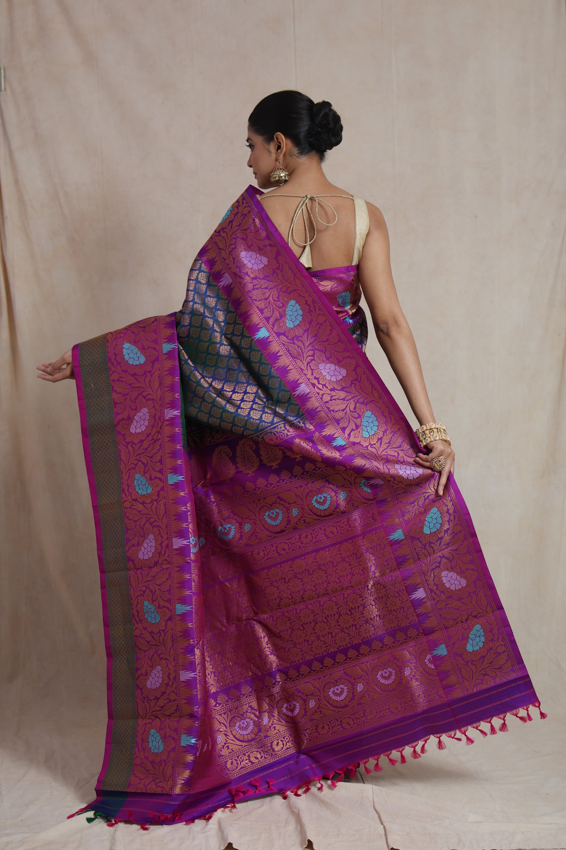 Back view showcasing the richly woven magenta pallu of the Gadwal Silk Saree