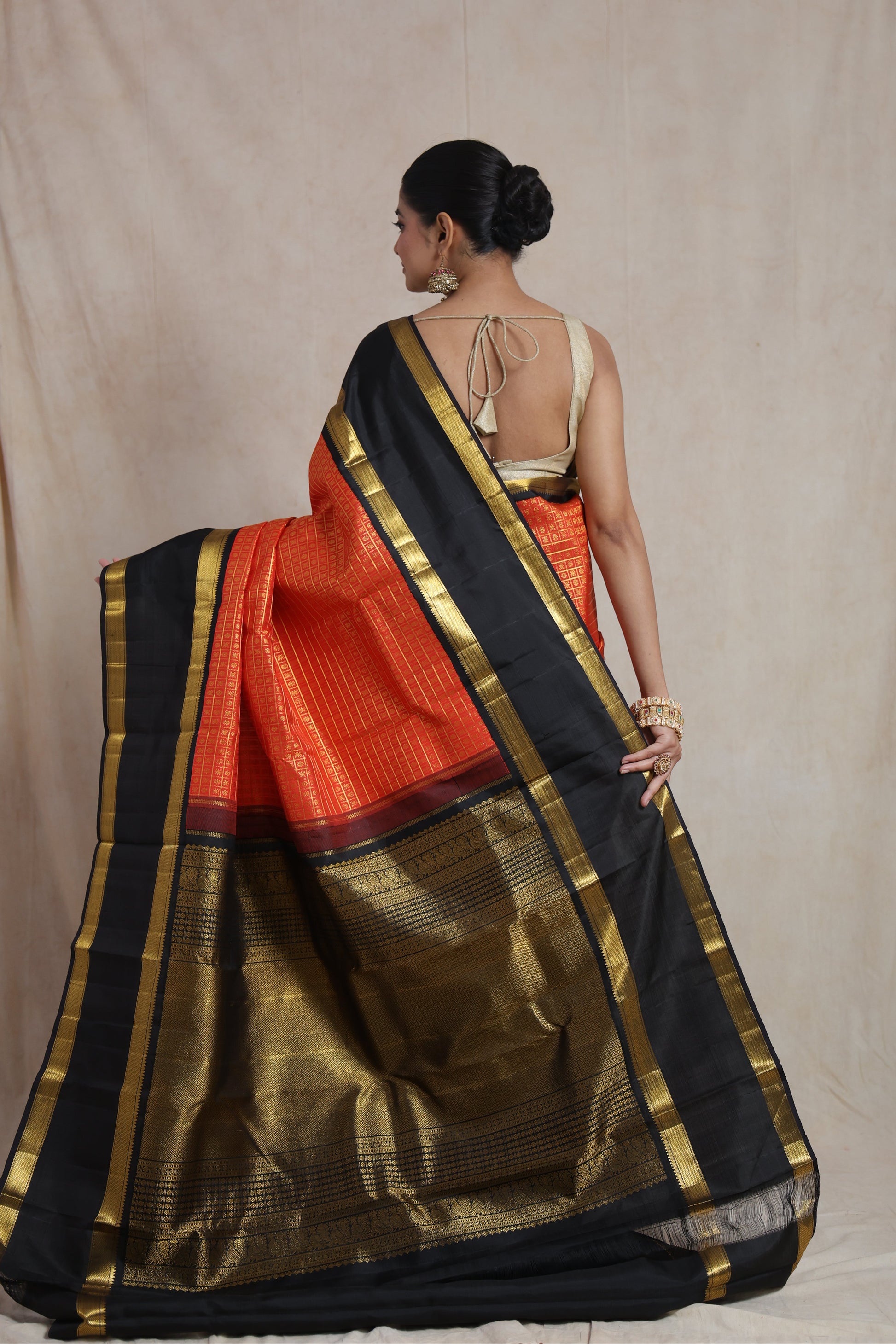 Rich black pallu of Kanjivaram pure silk saree featuring elegant traditional woven detailing