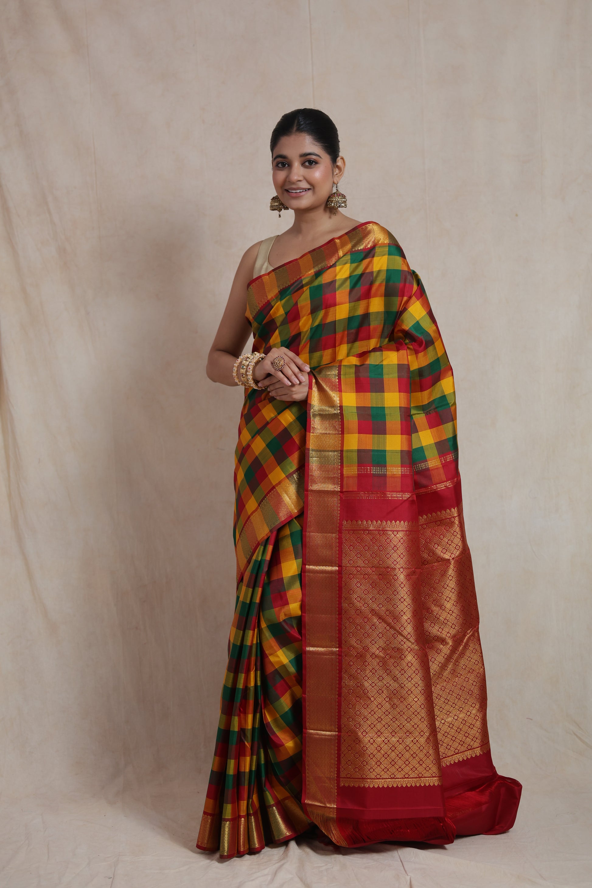 Elegant Kanjivaram pure silk saree featuring vibrant multicolor checks and red pallu