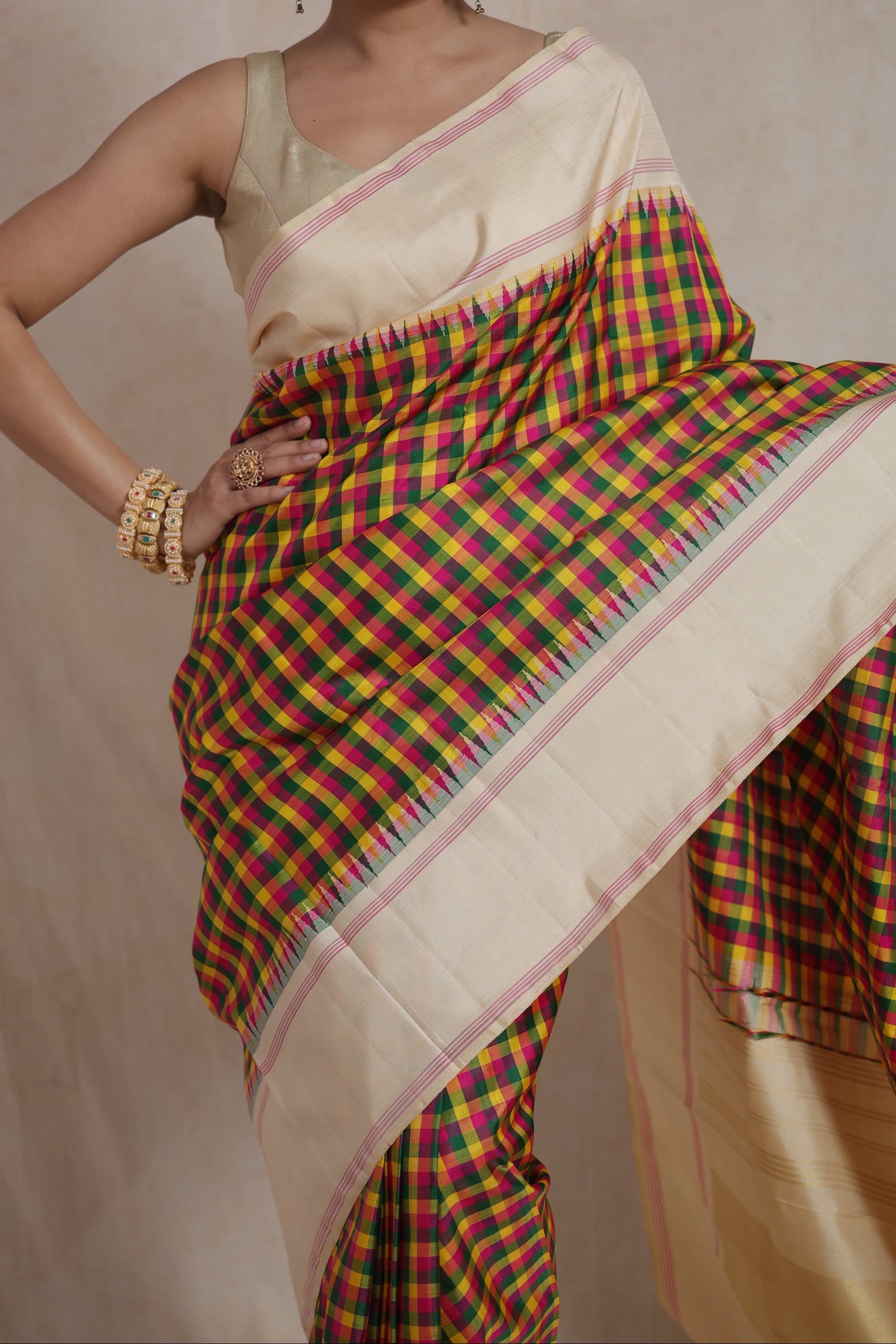 Detailed view of multicolor checked Kanjivaram pure silk saree with ivory border and elegant woven finish