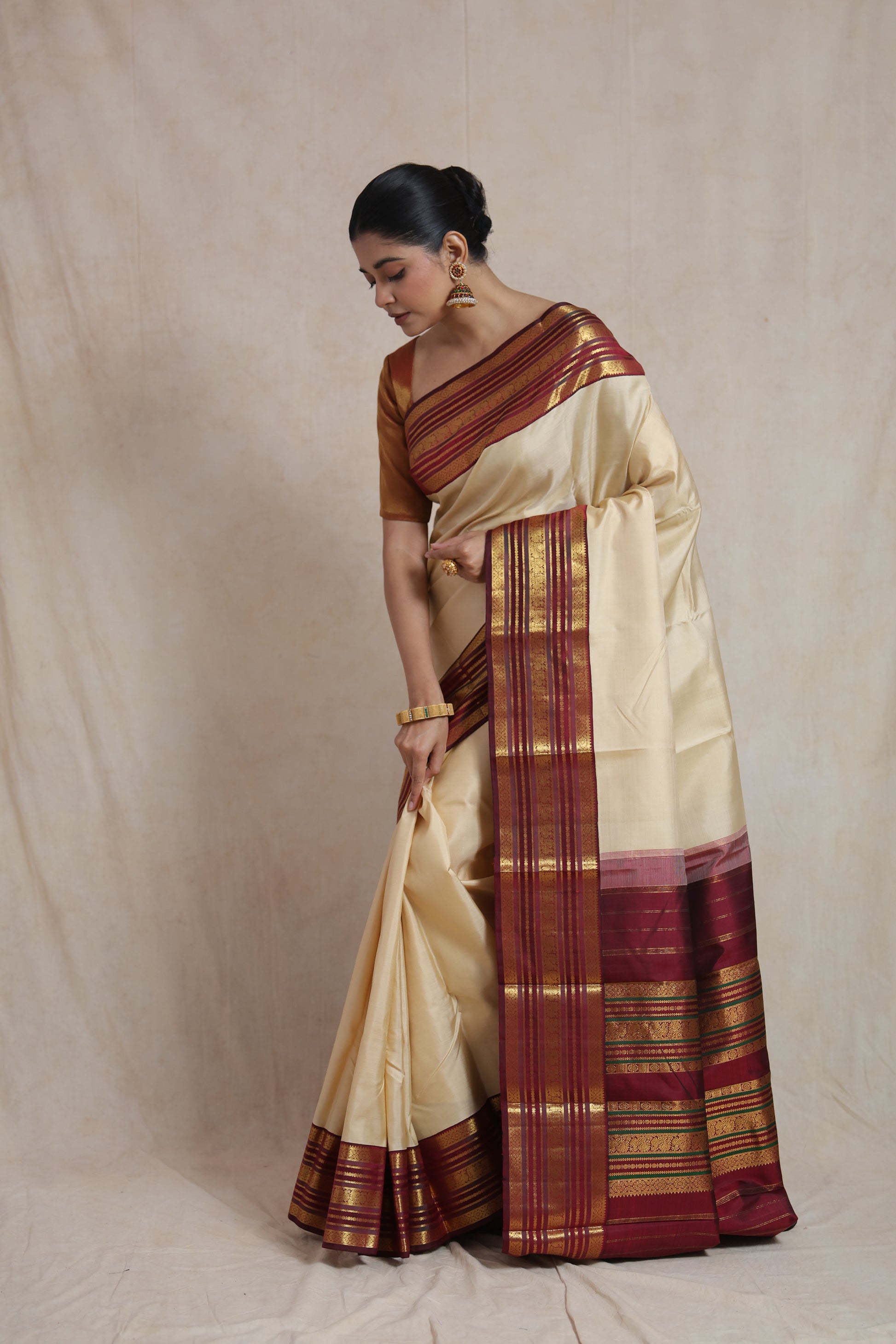 Kanjivaram pure silk saree with traditional woven brown border