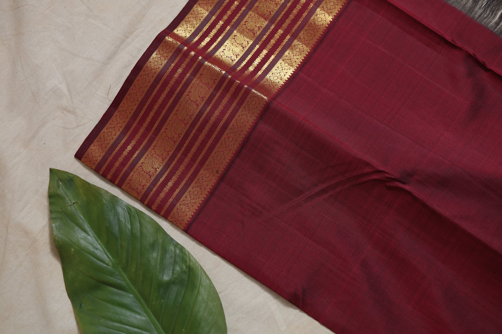 Kanjivaram pure silk saree with maroon woven border