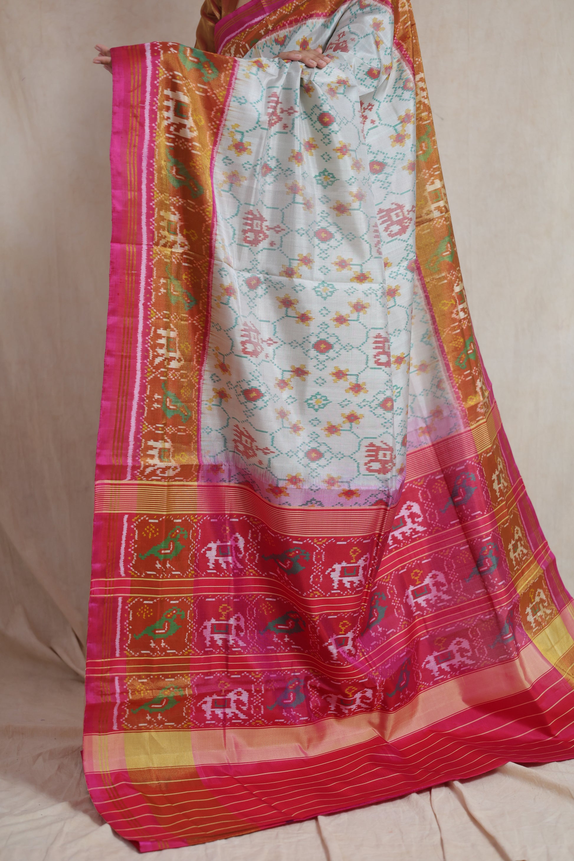 Rich pallu detail featuring traditional Ikat motifs on the Patola silk saree