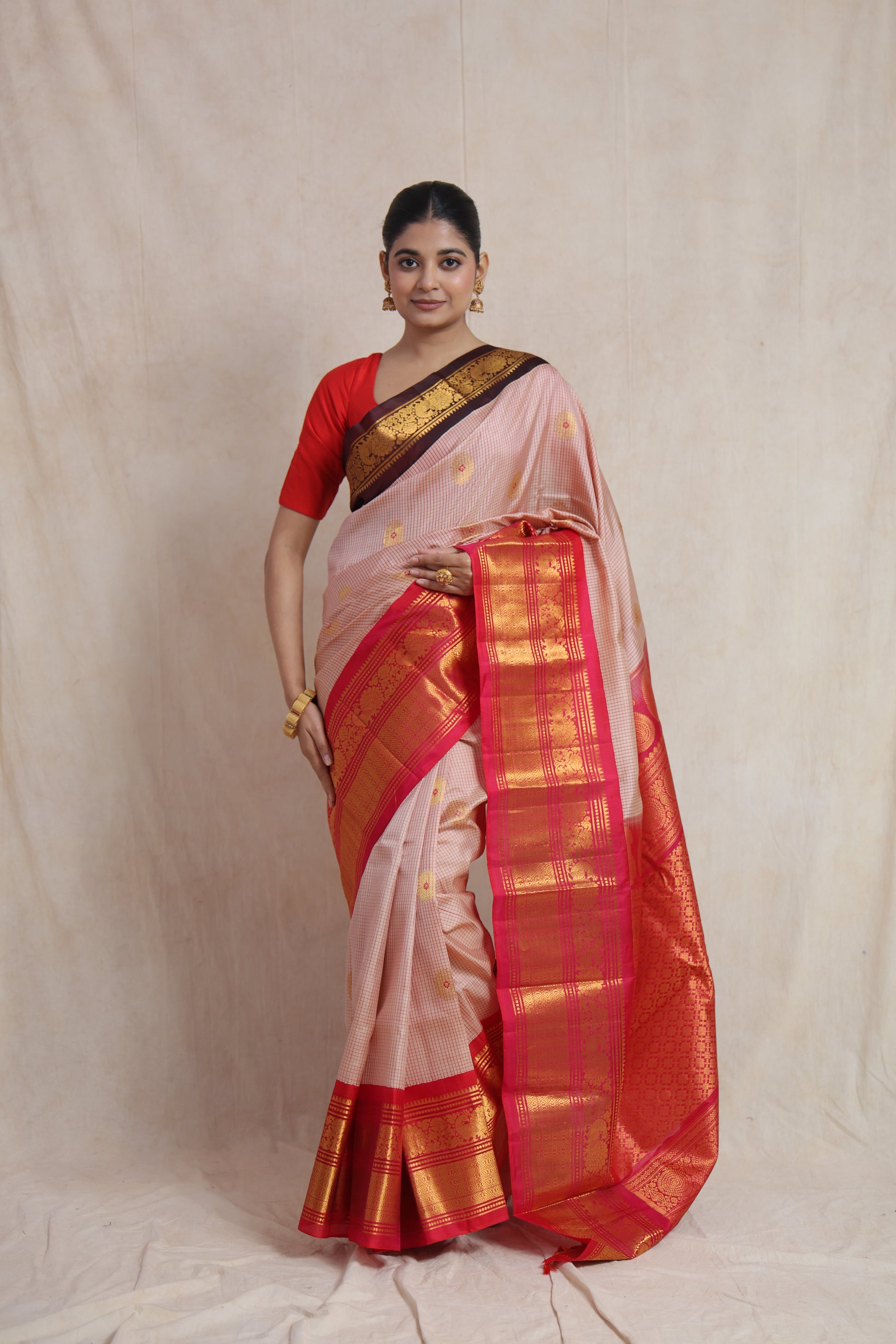 Ivory beige Gadwal handloom silk saree with crimson red border and traditional woven pallu