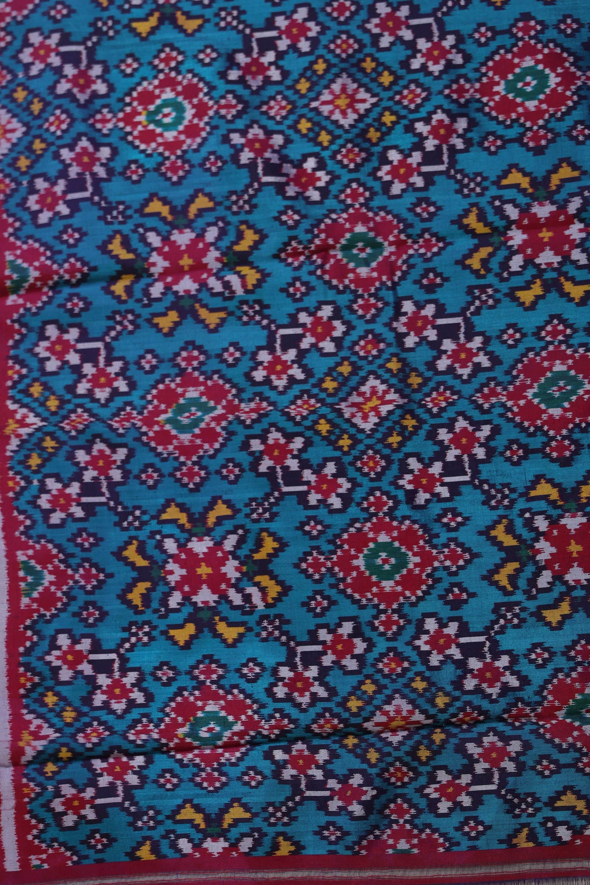 Close-up of multicolor Ikat pattern on the Patola silk saree