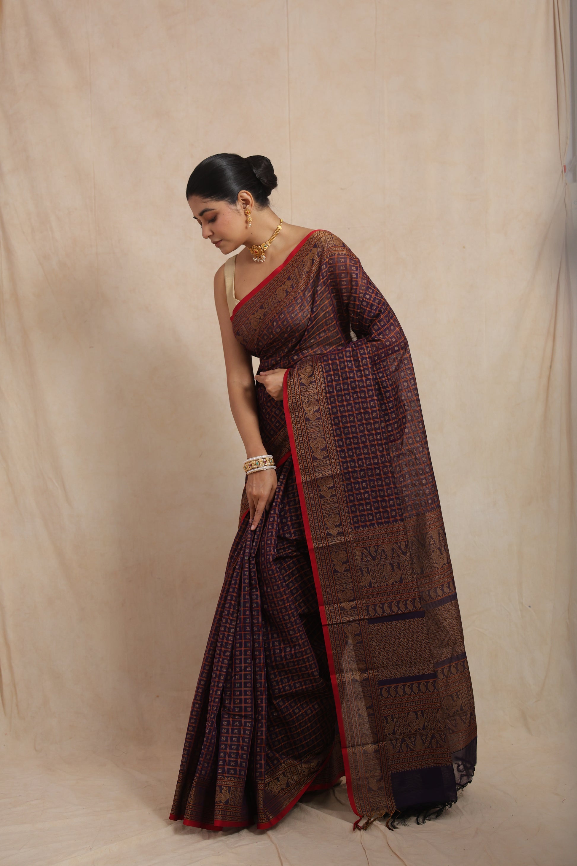 Traditional VIOLET blue cotton saree with detailed woven border and classic drape