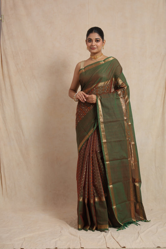 Full front view of olive green Kanchipuram cotton saree with classic zari woven border