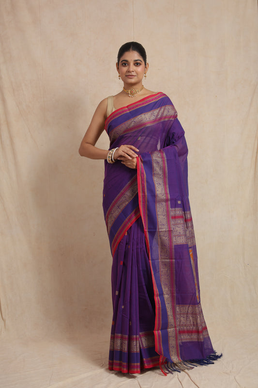 Royal purple Kanchipuram handloom cotton saree with rani pink border and traditional woven pallu