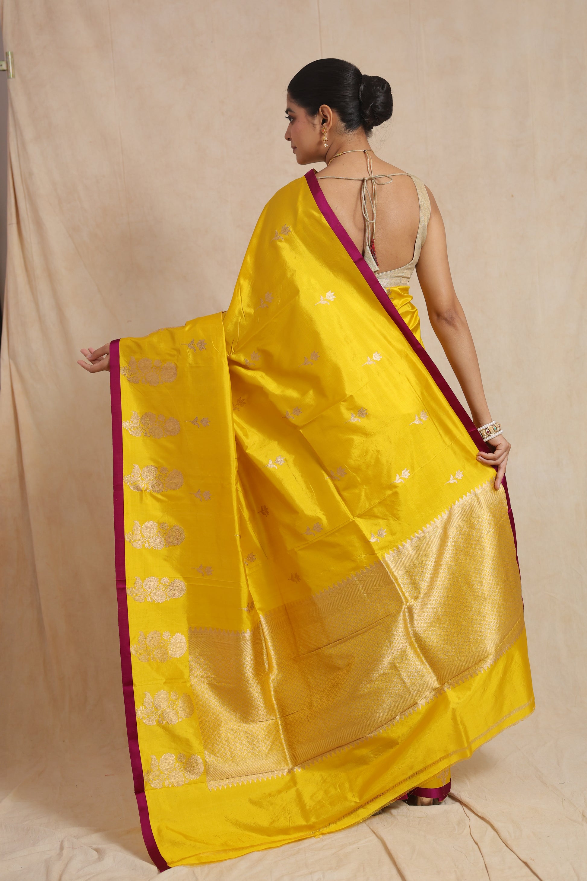 Back view of the Banarasi silk saree showcasing the richly woven pallu