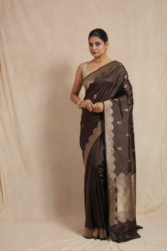 Full front view of espresso brown Banarasi art silk saree with elegant floral buttas and traditional woven pallu