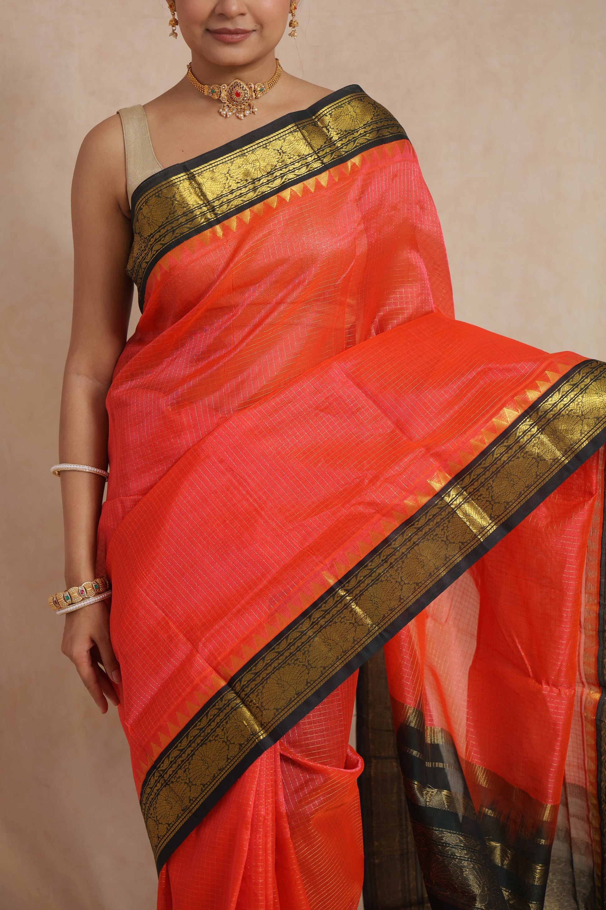 Close-up of woven checks and black-gold traditional border on Kanchipuram SICO saree