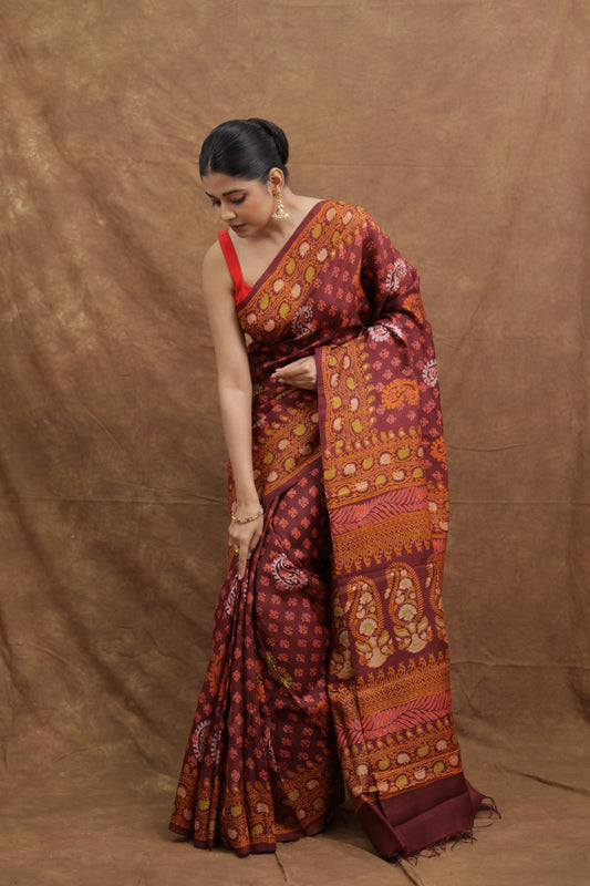 Maroon Batik Tussar Saree with Traditional Paisley Motifs