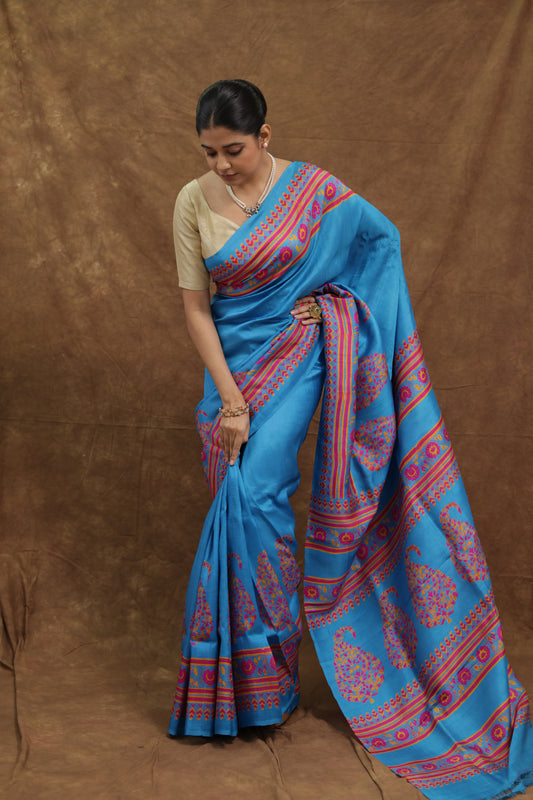 Turquoise Blue Batik Silk Saree with Pink Artistic Border & Paisley Pallu