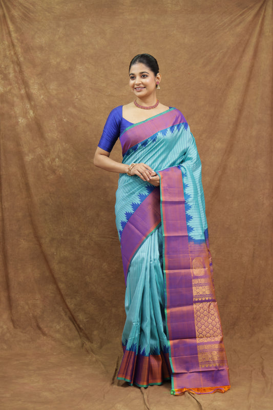Turquoise Blue Gadwal Silk Saree with Magenta Border & Gold Woven Pallu