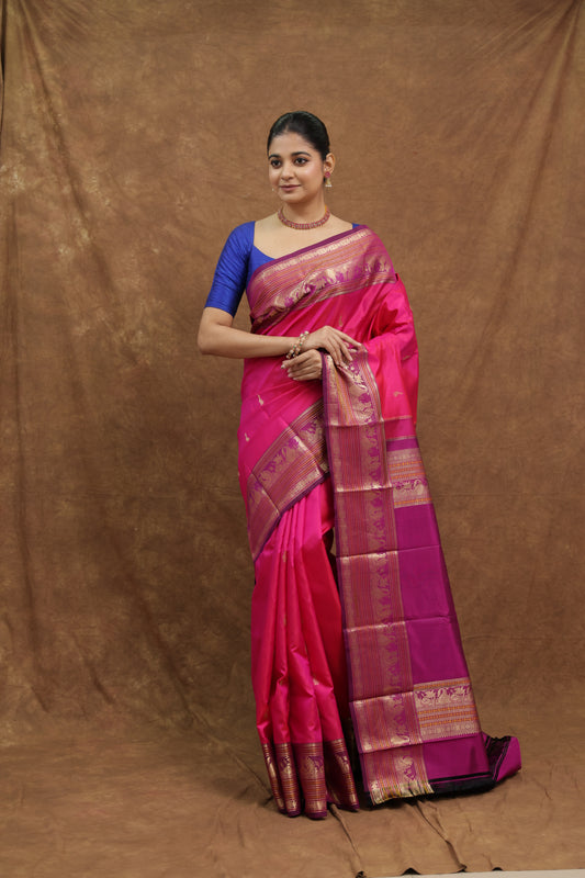 Rani Pink Kanjeewaram Silk Saree with Purple Border & Rich Gold Woven Pallu