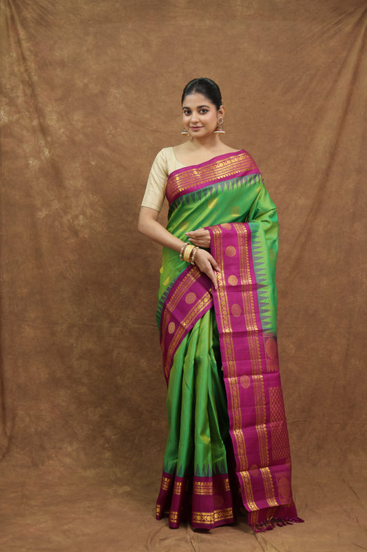 Emerald Green Gadwal Silk Saree with Magenta Border & Rich Gold Woven Pallu