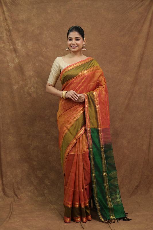 Burnt Orange Kanchipuram SICO Saree with Emerald Green Border & Rich Woven Pallu