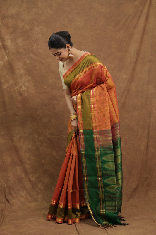 Burnt Orange Kanchipuram SICO Saree with Emerald Green Border & Rich Woven Pallu
