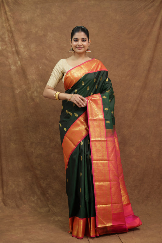 Forest Green Kanjeewaram Silk Saree with Coral Orange Border & Rich Gold Woven Pallu