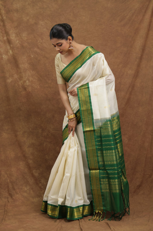 Off-White Kanchipuram SICO Saree with Emerald Green Border & Rich Woven Pallu