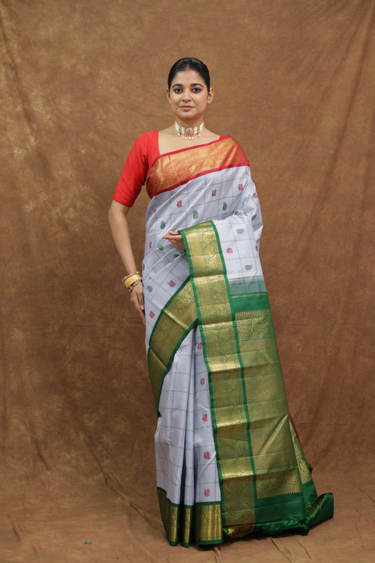 Pearl Blue Kanjeewaram Silk Saree with Emerald Green Border & Rich Woven Pallu