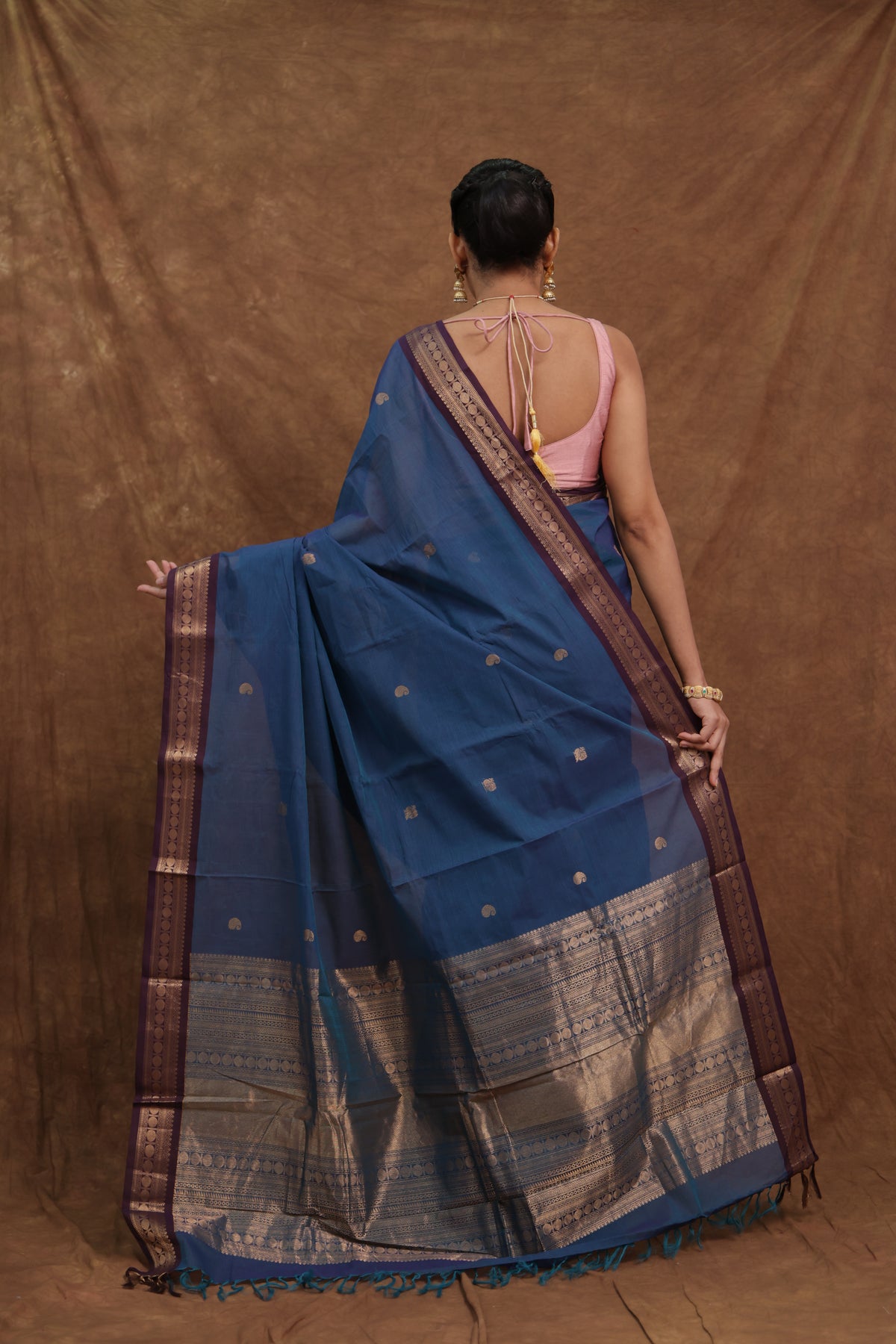 Blue Kanchipuram cotton saree with rust woven border, traditional Joyee Kolkata sari featuring intricate woven details.