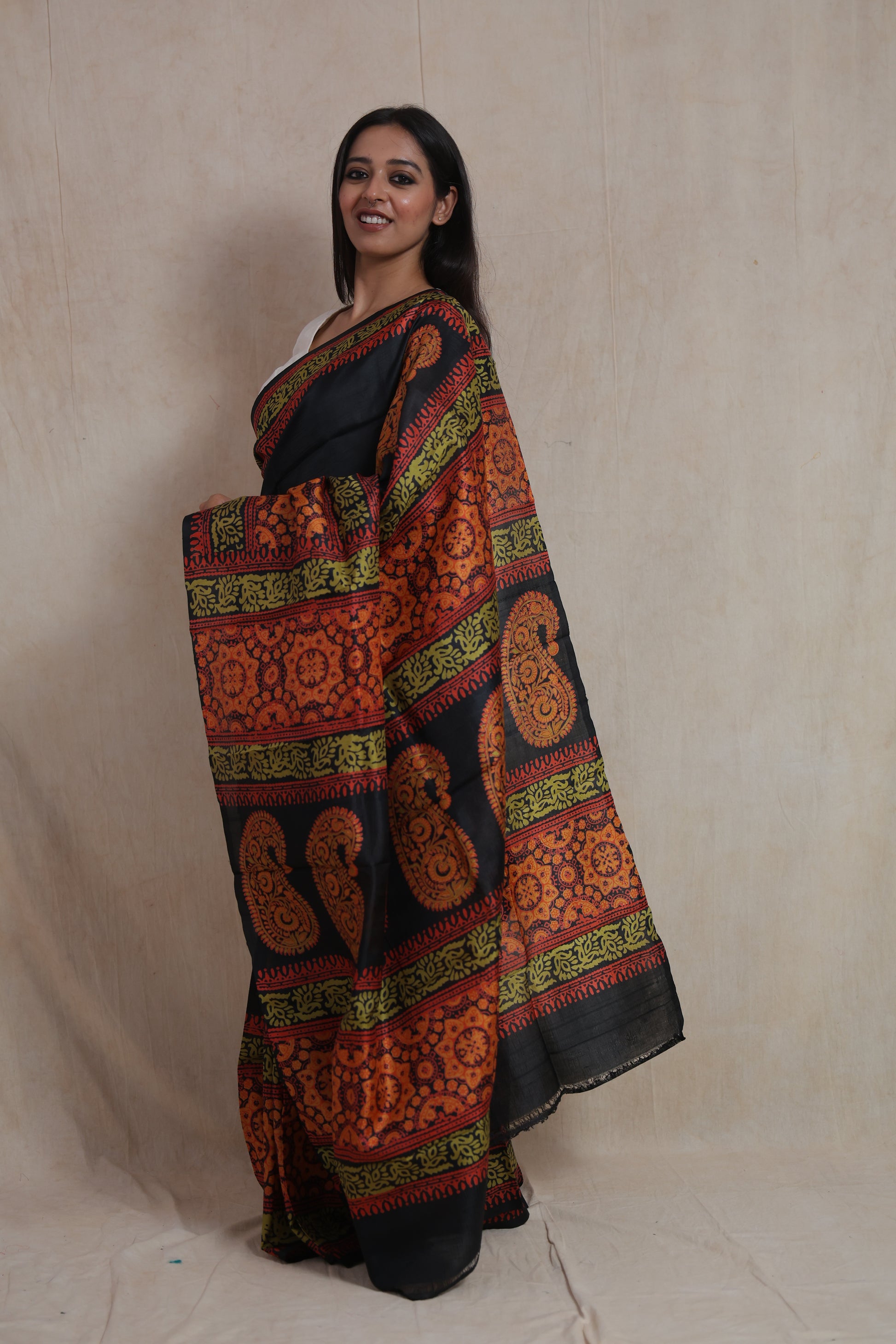 Side view of handcrafted Batik silk saree featuring traditional paisley patterned pallu