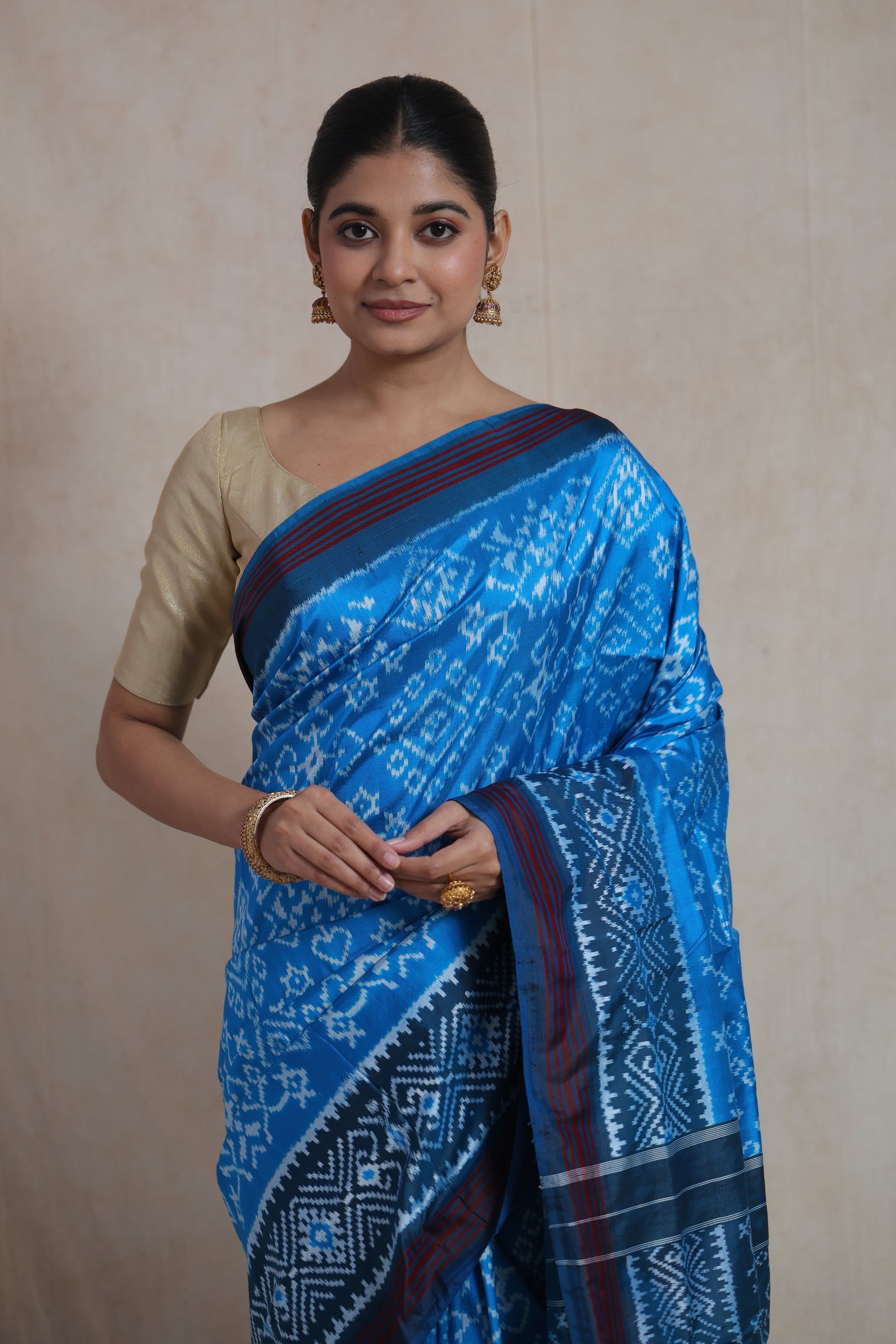 Portrait view of traditional sky blue Panchampali Ikat silk saree