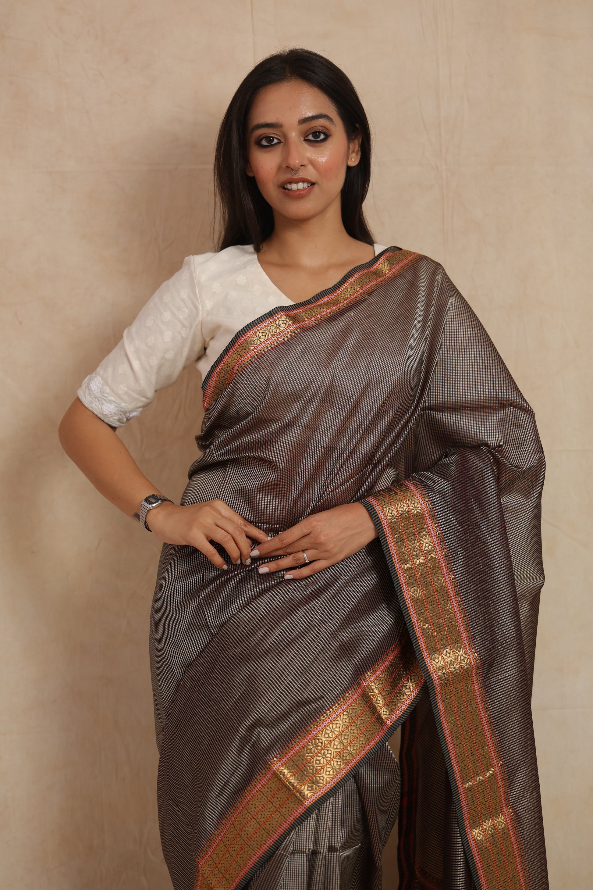 Elegant charcoal grey Maheshwari silk cotton saree with rich woven pallu