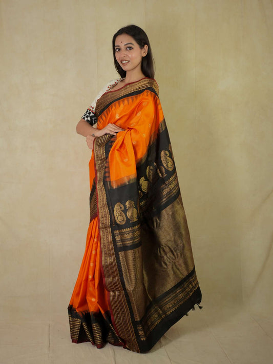 HANDWOVEN ORANGE COLOUR GADWAL SILK SAREE WITH 94 CM BLOUSE PIECE