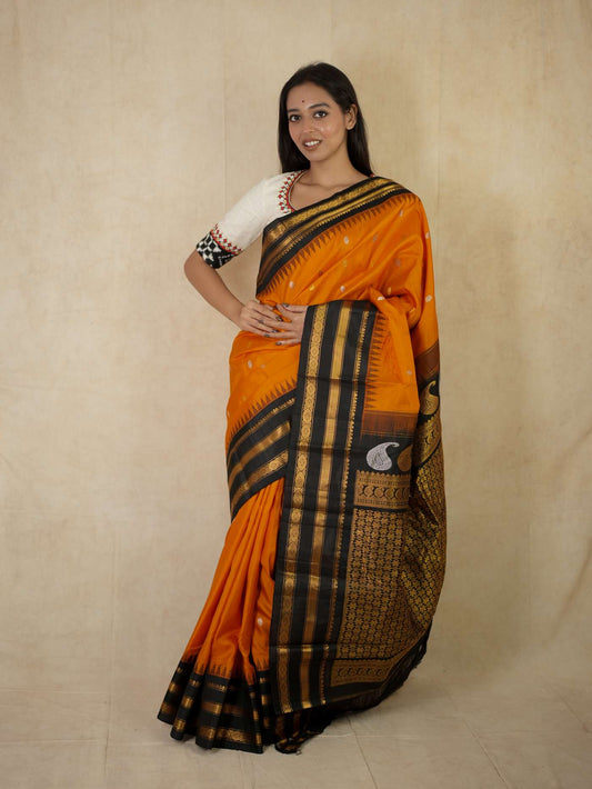 HANDWOVEN ORANGE COLOUR GADWAL SILK SAREE WITH 95 CM BLOUSE PIECE