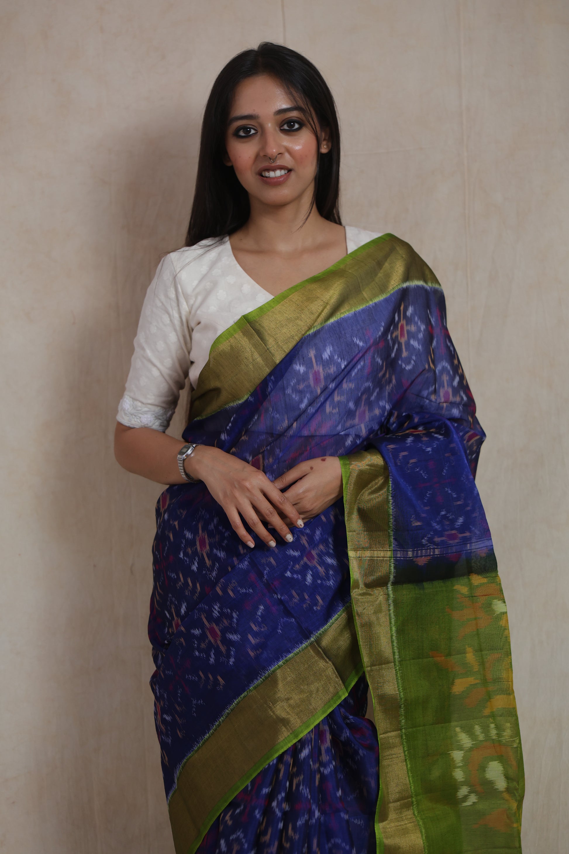 Front view of royal indigo Panchampali handloom silk cotton saree with contrast green pallu