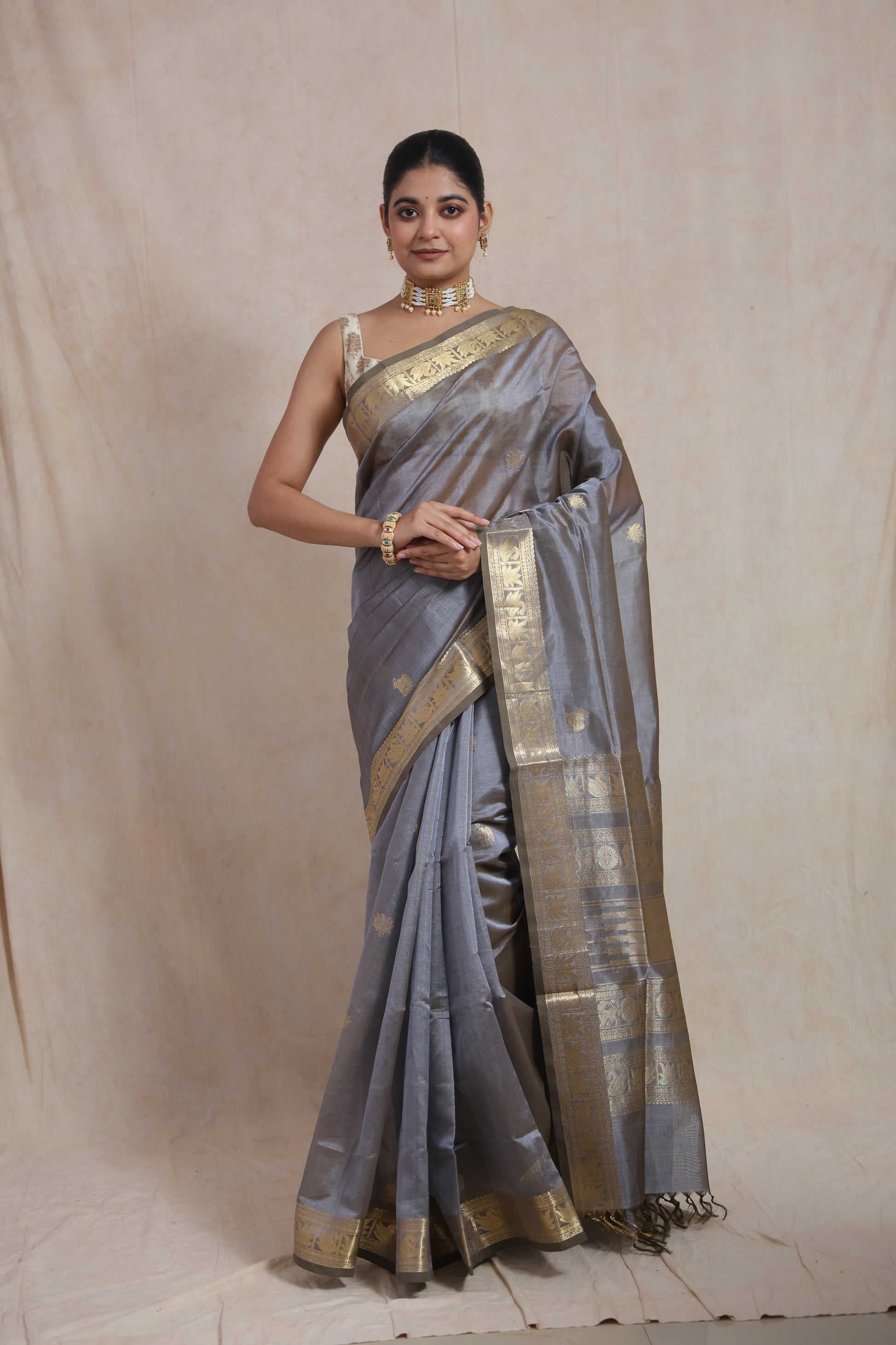 Detailed pallu view of steel grey Kanchipuram Sico saree with antique gold zari weaving