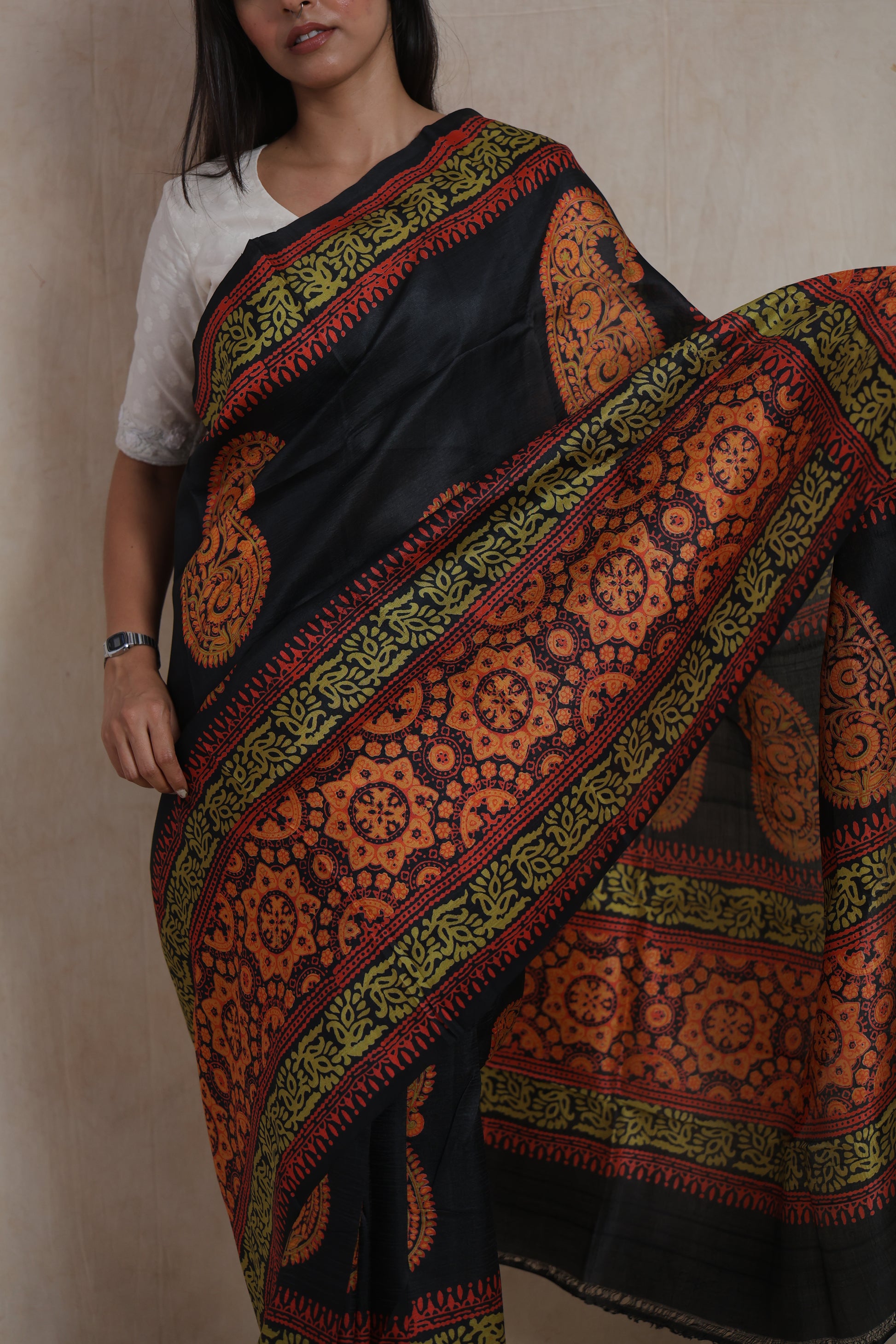 Detailed view of Batik silk saree highlighting traditional paisley and floral artwork