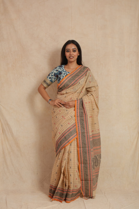 Full-length look of beige Kanchipuram cotton saree with detailed pallu