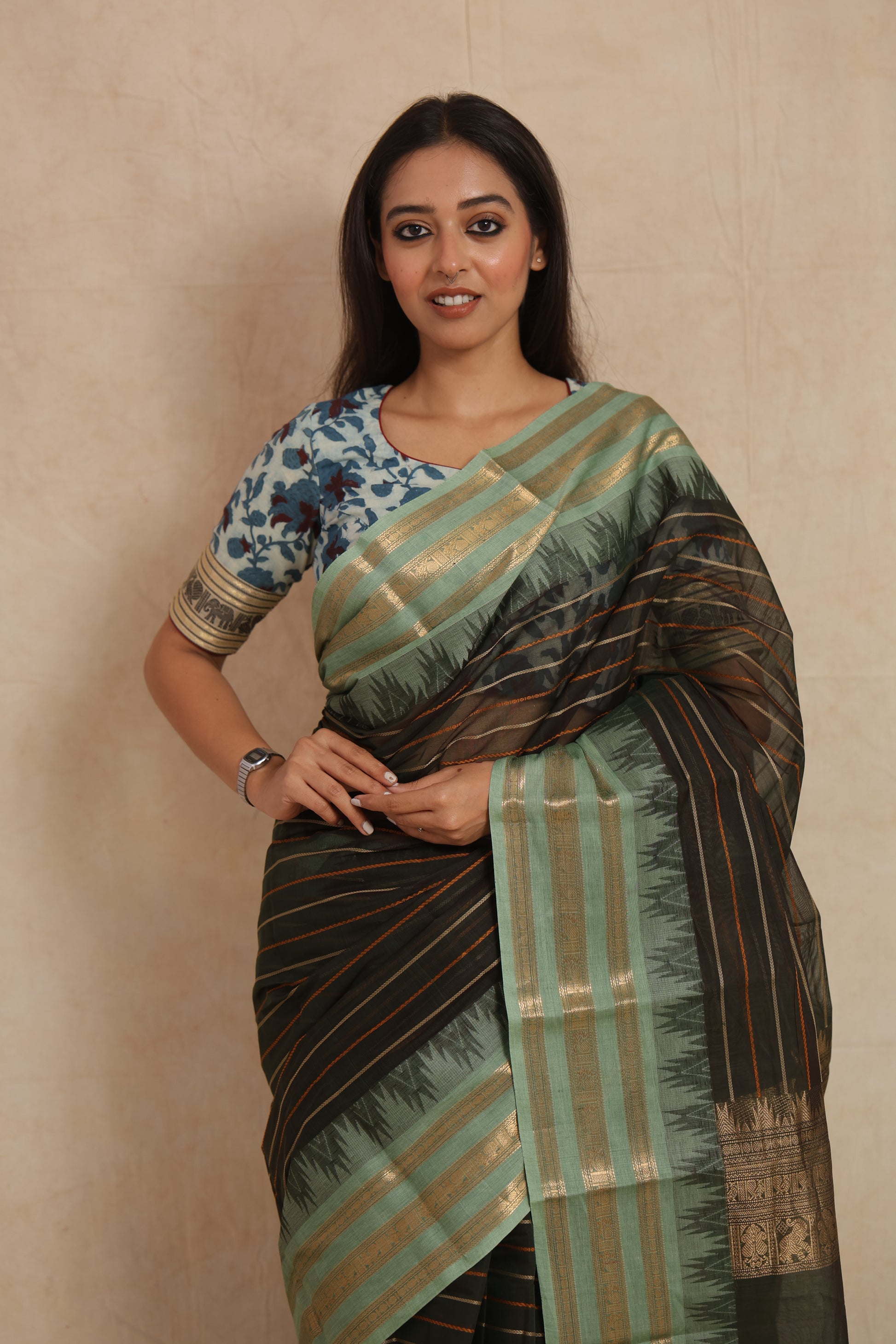 Detailed woven border and pallu design of black Kanchipuram cotton saree