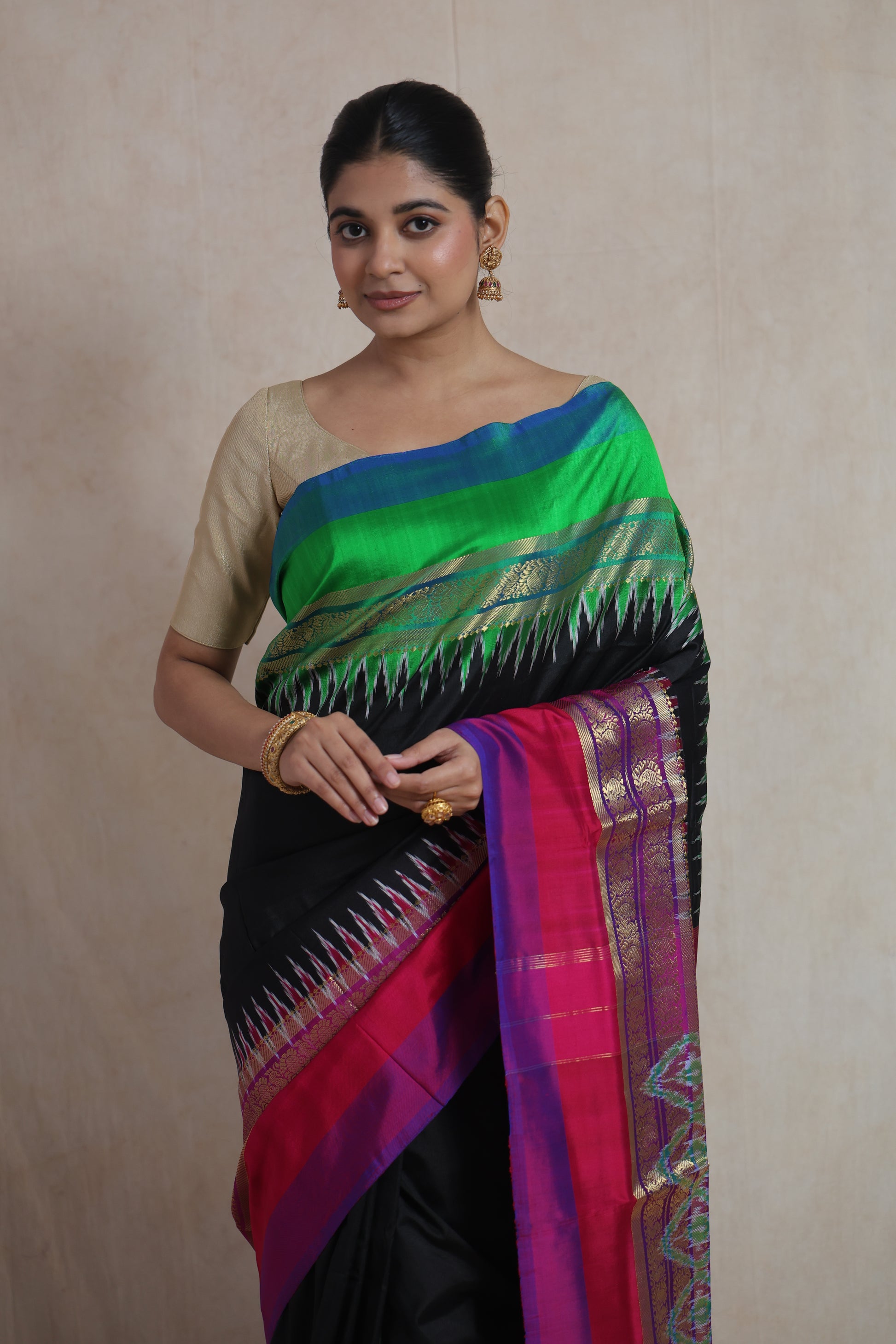 Portrait view of traditional black Panchampali silk saree with woven motifs