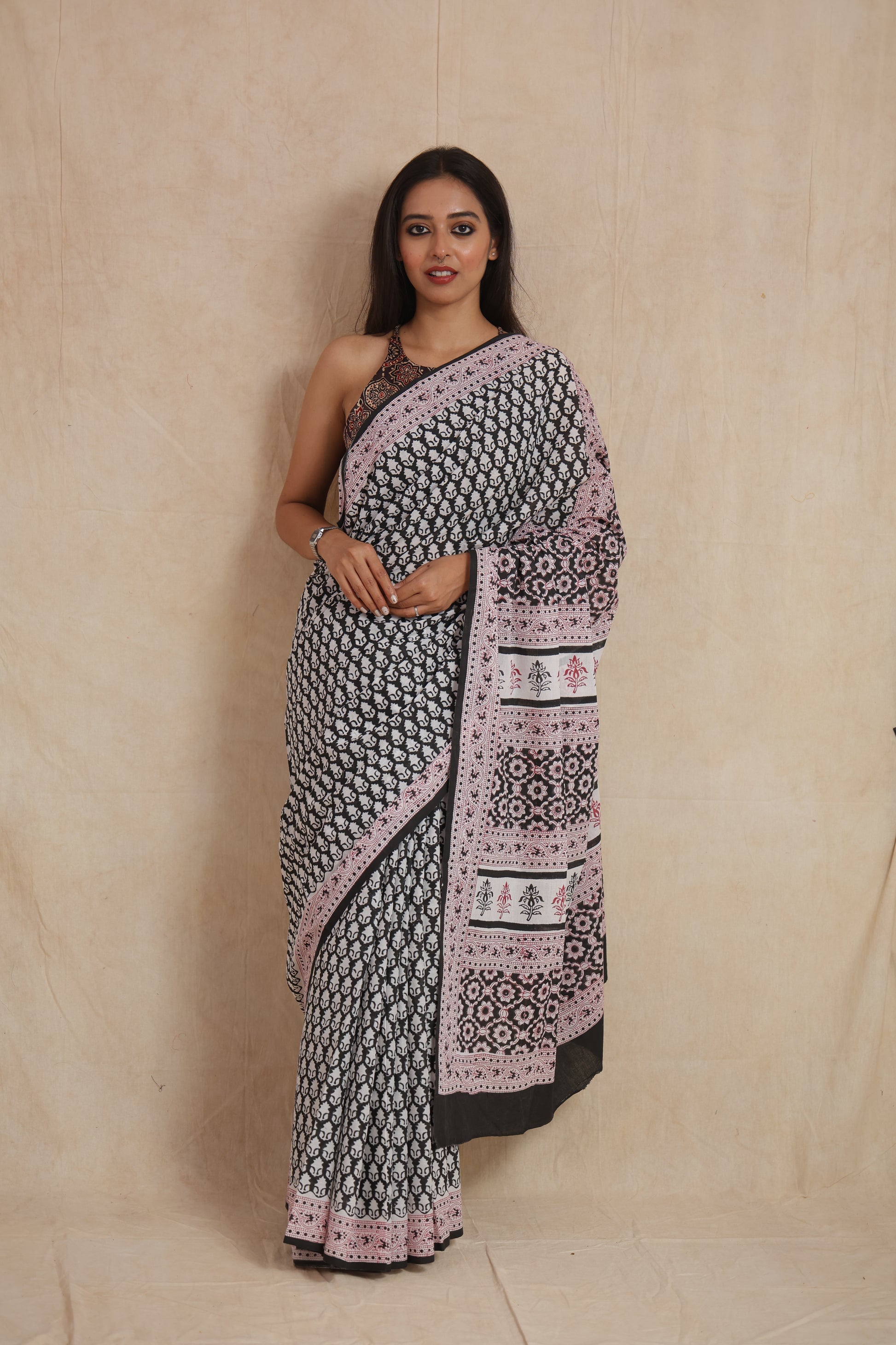 Black and white Sanganeri cotton saree with pink printed border