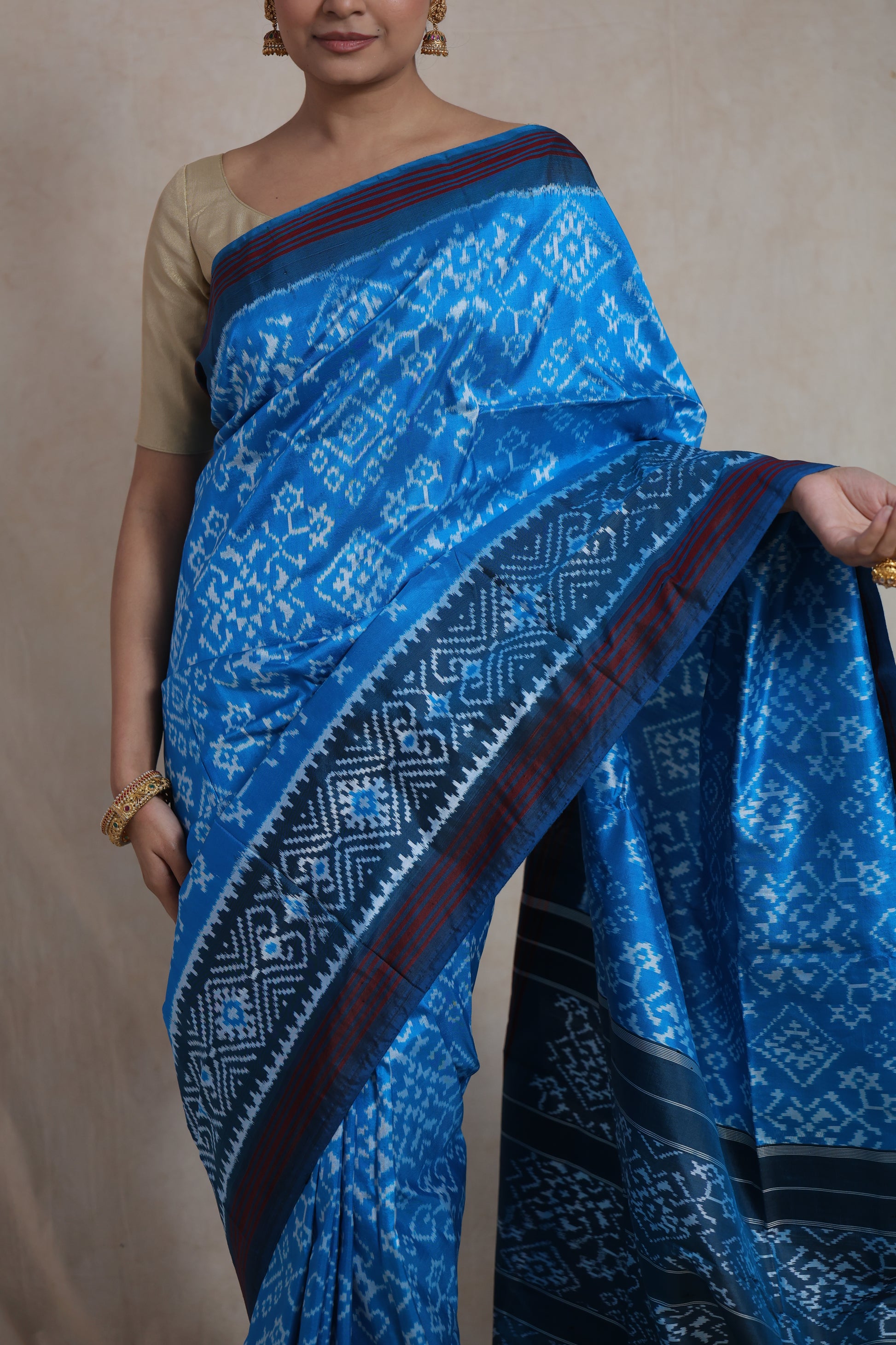 Close-up of sky blue Panchampali silk saree with intricate Ikat weaving