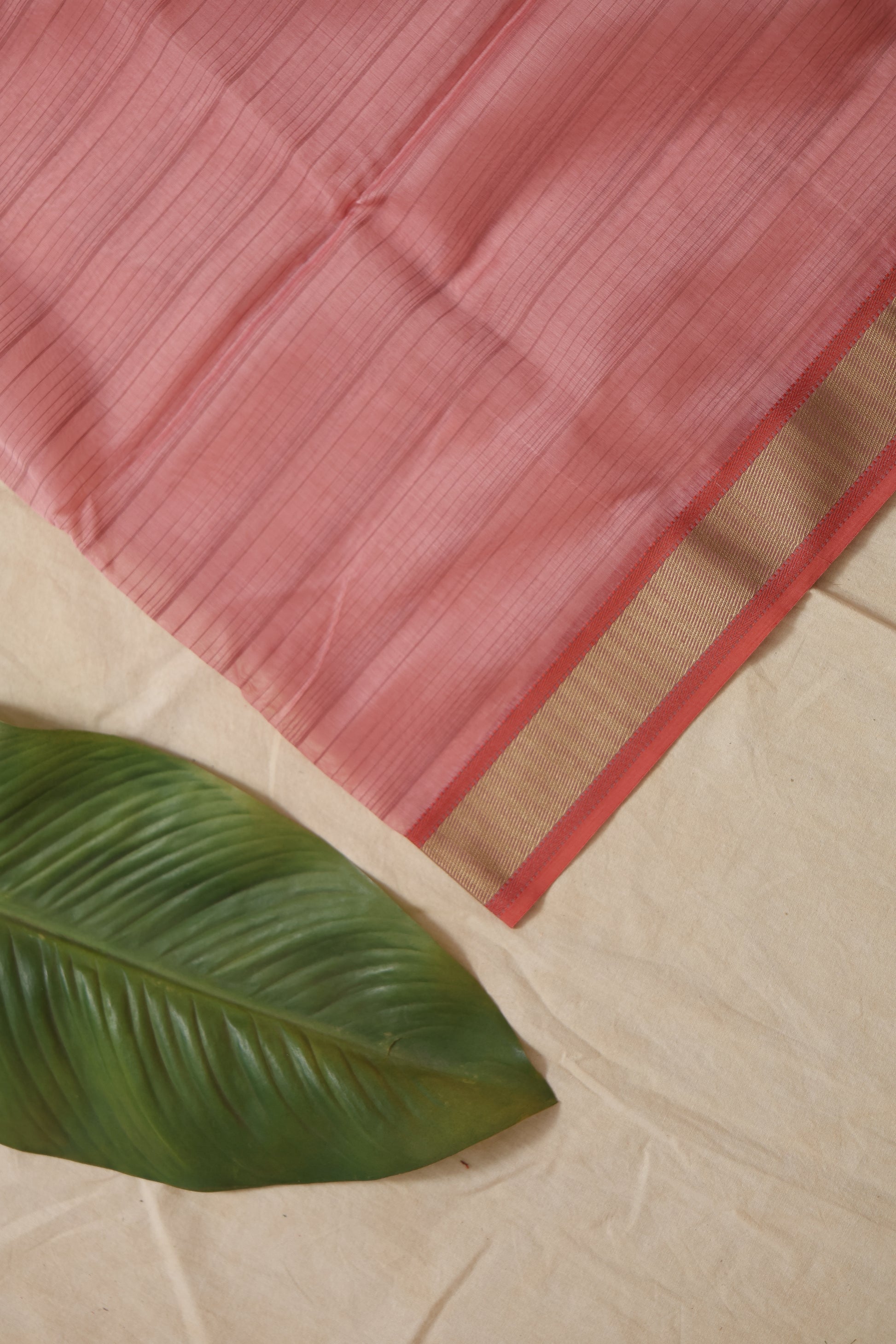 Border detail of blush pink Maheshwari cotton saree