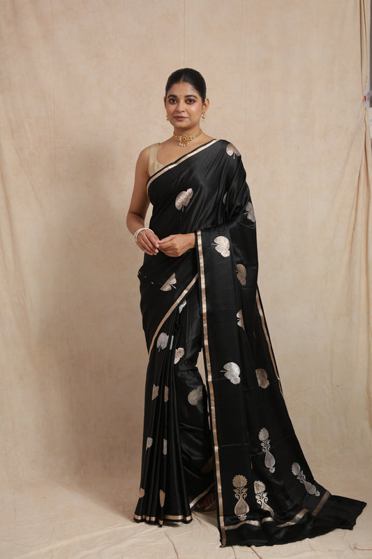 Full look of elegant black Banarasi silk saree with woven silver detailing