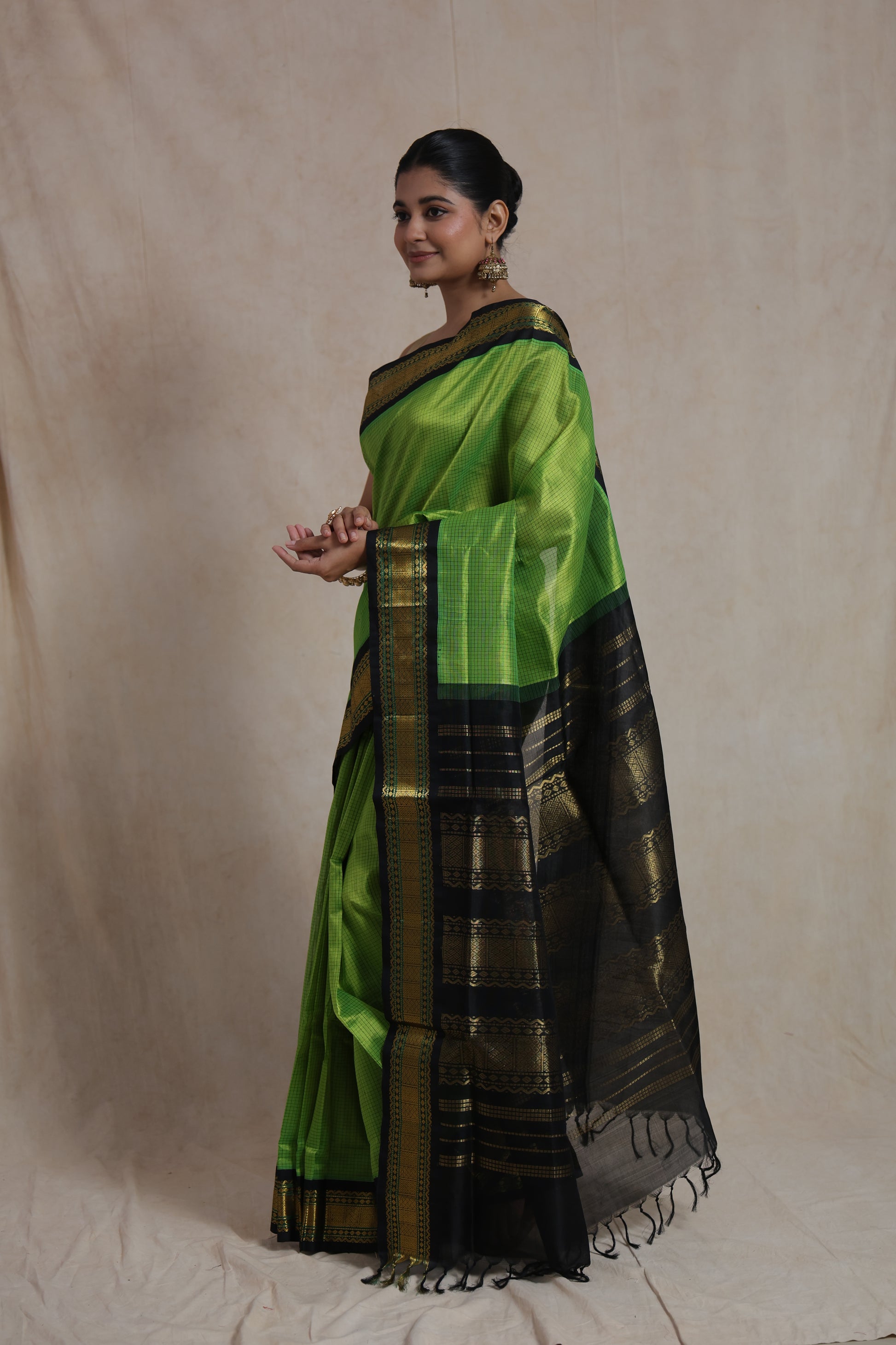 Elegant portrait of parrot green Kanchipuram silk cotton saree